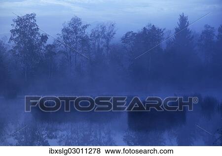"Morning fog over a moor pond, Nicklheim; Voralpenland, Raubling, Bavaria, Germany, Europe" View Large Photo Image Stock Photo - "Morning fog over a moor pond, Nicklheim; Voralpenland, Raubling, Bavaria, Germany, Europe". Fotosearch