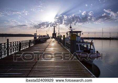 "Morning light in the harbor of Konstanz with Imperia and ships, Lake Constance, Baden-Wuerttemberg, Germany, Europe, PublicGround, Europe" View Large Photo Image Stock Photo - "Morning light in the harbor of Konstanz with Imperia and ships, Lake Constance, Baden-Wuerttemberg, Germany, Europe, PublicGround, Europe". Fotosearch