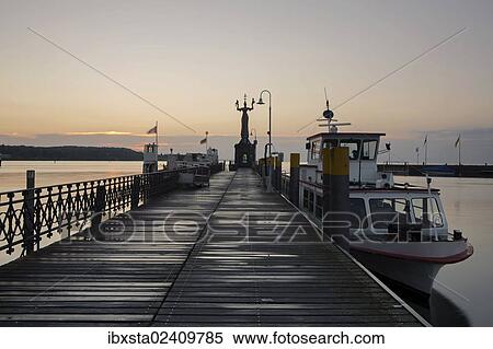 "Morning light in the port of Konstanz with Imperia and a ship, Lake Constance, Baden-Wuerttemberg, Germany, Europe" View Large Photo Image Stock Photography - "Morning light in the port of Konstanz with Imperia and a ship, Lake Constance, Baden-Wuerttemberg, Germany, Europe". Fotosearch