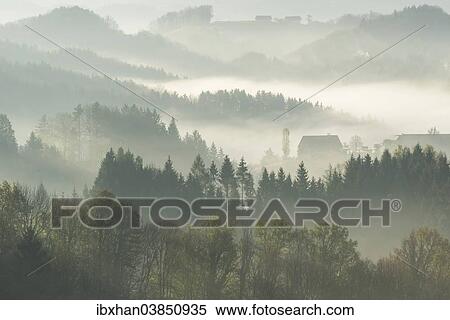 "Morning mist over wooded hills, Eichberg-Trautenburg, Styria, Austria, Europe" View Large Photo Image Stock Photography - "Morning mist over wooded hills, Eichberg-Trautenburg, Styria, Austria, Europe". Fotosearch