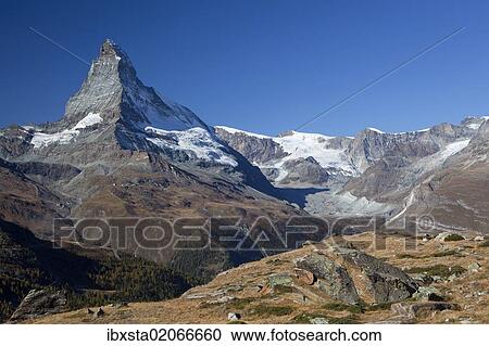 Stock Image - "Morning mood at Lake Stellisee looking towards the Matterhorn, Zermatt, Valais, Swiss Alps, Switzerland, Europe, PublicGround, Europe". Fotosearch