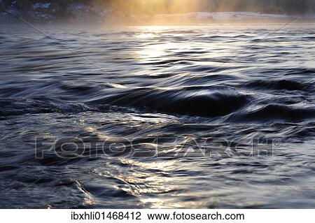 Stock Image - "Morning mood at the floodplains of Isar River, Isarauen, near Geretsried, Bad Toelz-Wolfratshausen, Upper Bavaria, Bavaria, Germany, Europe". Fotosearch