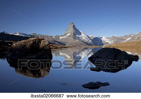 "Morning mood with the Matterhorn reflected in Lake Stellisee, Zermatt, Valais, Swiss Alps, Switzerland, Europe, PublicGround, Europe" View Large Photo Image Stock Photo - "Morning mood with the Matterhorn reflected in Lake Stellisee, Zermatt, Valais, Swiss Alps, Switzerland, Europe, PublicGround, Europe". Fotosearch