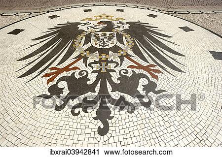 "Mosaic, imperial eagle of the German Empire from 1888 on, Wappeninsel, Castle Square, Wiesbaden, Hesse, Germany, Europe" View Large Photo Image Stock Image - "Mosaic, imperial eagle of the German Empire from 1888 on, Wappeninsel, Castle Square, Wiesbaden, Hesse, Germany, Europe". Fotosearch