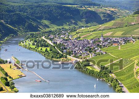 Stock Photo - "Moselle River with the village of Enkirch surrounded by vineyards, Bernkastel-Wittlich, Rhineland-Palatinate, Germany, Europe". Fotosearch