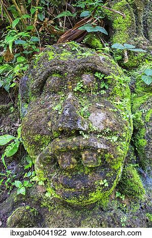 "Moss-covered sculpture in the forest, Goa Gajah Elephant Cave complex, Bali, Indonesia, Asia" View Large Photo Image Stock Image - "Moss-covered sculpture in the forest, Goa Gajah Elephant Cave complex, Bali, Indonesia, Asia". Fotosearch