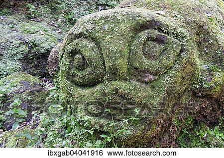 "Moss-covered sculpture in the forest, Goa Gajah Elephant Cave complex, Bali, Indonesia, Asia" View Large Photo Image Stock Photograph - "Moss-covered sculpture in the forest, Goa Gajah Elephant Cave complex, Bali, Indonesia, Asia". Fotosearch