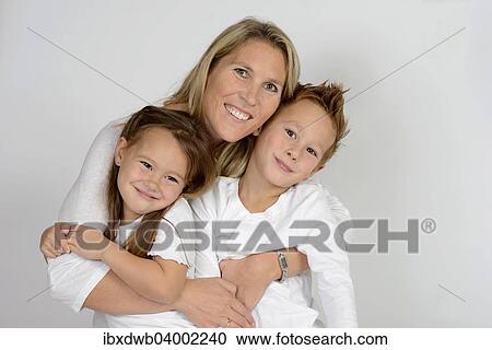 "Mother with her two children, boy and girl" View Large Photo Image Stock Image - "Mother with her two children, boy and girl". Fotosearch