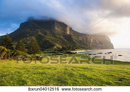 Stock Photograph - "Mount Lidgbird and Mount Gower in the evening light, Lord Howe Island, New South Wales, Australia, Oceania". Fotosearch