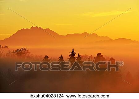 "Mount Pilatus above fog at sunset, Canton of Zug, Switzerland, Europe" View Large Photo Image Picture - "Mount Pilatus above fog at sunset, Canton of Zug, Switzerland, Europe". Fotosearch