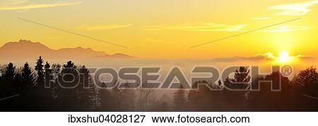 Stock Photo - "Mount Pilatus above fog at sunset, Canton of Zug, Switzerland, Europe". Fotosearch