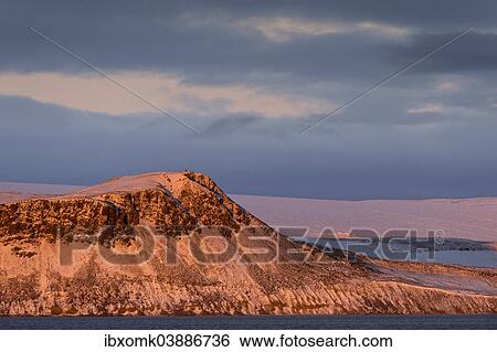 "Mountain and glacier in the evening light, Hinlopenstretet, Svalbard Archipelago, Svalbard and Jan Mayen, Norway, Europe" View Large Photo Image Stock Photograph - "Mountain and glacier in the evening light, Hinlopenstretet, Svalbard Archipelago, Svalbard and Jan Mayen, Norway, Europe". Fotosearch