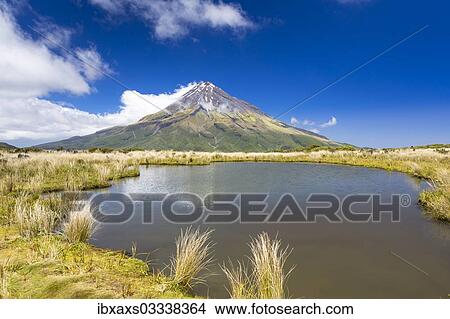 Picture - "Mountain lake with the Mount Taranaki volcano, Pouakai Range, Egmont National Park, Taranaki Region, New Zealand, Oceania". Fotosearch