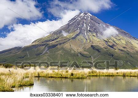 "Mountain lake with the Mount Taranaki volcano, Pouakai Range, Egmont National Park, Taranaki Region, New Zealand, Oceania" View Large Photo Image Stock Image - "Mountain lake with the Mount Taranaki volcano, Pouakai Range, Egmont National Park, Taranaki Region, New Zealand, Oceania". Fotosearch