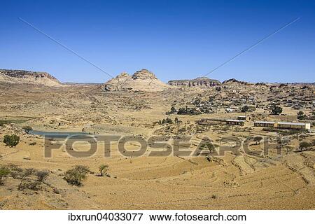 "Mountain landscape along the road from Asmarra to Qohaito with a little pond, Eritrea, Africa" View Large Photo Image Stock Photo - "Mountain landscape along the road from Asmarra to Qohaito with a little pond, Eritrea, Africa". Fotosearch
