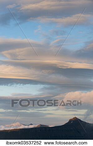 "Mountain landscape in the evening light with a cloudy sky, Slaettaratindur, Eysturoy, Faroe Islands, Denmark, Europe" View Large Photo Image Stock Image - "Mountain landscape in the evening light with a cloudy sky, Slaettaratindur, Eysturoy, Faroe Islands, Denmark, Europe". Fotosearch