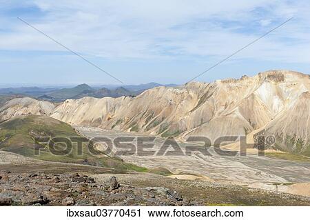 "Mountain landscape, yellowish rhyolite rock, partly overgrown with moss, wild river of Jokulgilskvisl, view from Skalli Mountain, Landmannalaugar, Highlands, Suourland, Iceland, Europe" View Large Photo Image Stock Image - "Mountain landscape, yellowish rhyolite rock, partly overgrown with moss, wild river of Jokulgilskvisl, view from Skalli Mountain, Landmannalaugar, Highlands, Suourland, Iceland, Europe". Fotosearch