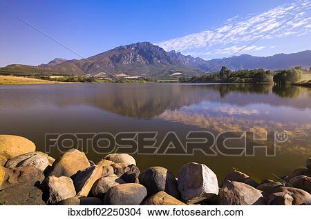 "Mountain, reflection in the reservoir, wine-growing region at Tulbagh, South Africa, Africa" View Large Photo Image Picture - "Mountain, reflection in the reservoir, wine-growing region at Tulbagh, South Africa, Africa". Fotosearch