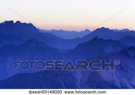 "Mountain ridges at sunset from Mount Hochiss in the Rofan massif, Rofan, Tyrol, Austria, Brandenberg Alps, Rofan, Tyrol, Austria, Europe" View Large Photo Image Stock Image - "Mountain ridges at sunset from Mount Hochiss in the Rofan massif, Rofan, Tyrol, Austria, Brandenberg Alps, Rofan, Tyrol, Austria, Europe". Fotosearch