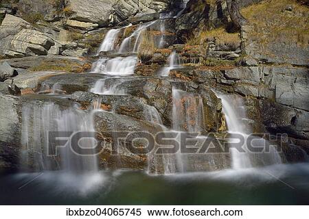 "Mountain river falls in several cascades into the river Grand Eyvia, Gran Paradiso National Park, Valle di Cogne, Piedmont, Italy, Europe" View Large Photo Image Stock Photography - "Mountain river falls in several cascades into the river Grand Eyvia, Gran Paradiso National Park, Valle di Cogne, Piedmont, Italy, Europe". Fotosearch