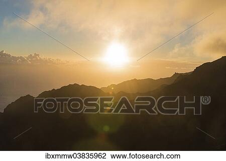 Stock Image - "Mountain silhouette at sunset, Tenerife, Canary Islands, Spain, Europe". Fotosearch