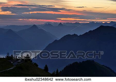 Stock Image - "Mountain silhouette, with Kleiner Mythen and Grosser Mythen mountains at the rear, Stanserhorn, Switzerland, Europe". Fotosearch