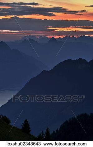 "Mountain silhouette, with Kleiner Mythen and Grosser Mythen mountains at the rear, Stanserhorn, Switzerland, Europe" View Large Photo Image Stock Image - "Mountain silhouette, with Kleiner Mythen and Grosser Mythen mountains at the rear, Stanserhorn, Switzerland, Europe". Fotosearch