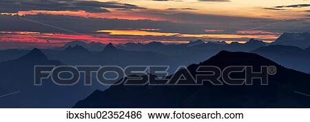 Stock Photograph - "Mountain silhouette, with Kleiner Mythen and Grosser Mythen mountains at the rear, Stanserhorn Mountain, Switzerland, Europe". Fotosearch