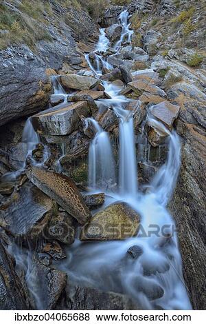 "Mountain stream with fallen larch needles on the stones, Gran Paradiso National Park, Valnontey, Piedmont, Italy, Europe" View Large Photo Image Stock Photo - "Mountain stream with fallen larch needles on the stones, Gran Paradiso National Park, Valnontey, Piedmont, Italy, Europe". Fotosearch