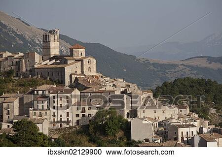 Stock Image - "Mountain village of Castel del Monte with scaffolded tower after earthquake in 2009, L'Aquila, Italy, Europe". Fotosearch