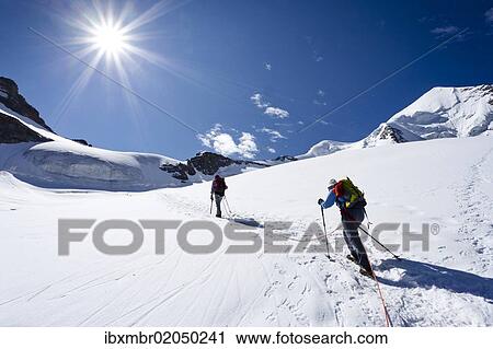 "Mountaineers during the ascent of Mt Piz Palue, summit of Mt Piz Palue at back, Grisons, Switzerland, Europe" View Large Photo Image Stock Image - "Mountaineers during the ascent of Mt Piz Palue, summit of Mt Piz Palue at back, Grisons, Switzerland, Europe". Fotosearch