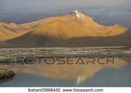 "Mountains in the evening light, at the salt lake Salar de Surire, Putre, Arica y Parinacota Region, Chile, South America" View Large Photo Image Stock Image - "Mountains in the evening light, at the salt lake Salar de Surire, Putre, Arica y Parinacota Region, Chile, South America". Fotosearch