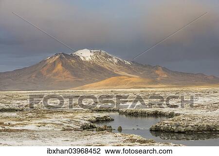 "Mountains in the evening light, at the salt lake Salar de Surire, Putre, Arica y Parinacota Region, Chile, South America" View Large Photo Image Stock Image - "Mountains in the evening light, at the salt lake Salar de Surire, Putre, Arica y Parinacota Region, Chile, South America". Fotosearch