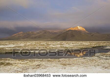 "Mountains in the evening light, at the salt lake Salar de Surire, Putre, Arica y Parinacota Region, Chile, South America" View Large Photo Image Stock Image - "Mountains in the evening light, at the salt lake Salar de Surire, Putre, Arica y Parinacota Region, Chile, South America". Fotosearch