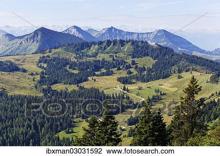 Stock Image - "Mountains of Illingerberg, Gennerhorn and Gruberhorn, view from Zwoelferhorn Mountain, Zwoelferhorn, Sankt Gilgen, Salzkammergut, Salzburg State, Austria, Europe". Fotosearch