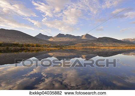 "Mountains reflected in Lake Doralstjornin or Doralstjornin, Rondane National Park, Norway, Europe" View Large Photo Image Stock Image - "Mountains reflected in Lake Doralstjornin or Doralstjornin, Rondane National Park, Norway, Europe". Fotosearch
