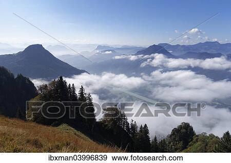 "Mt Kranzhorn with the Inn Valley and Mt Wildbarren, view from Mt Heuberg near Nussdorf am Inn, Chiemgau Alps, Chiemgau, Upper Bavaria, Bavaria, Germany, Europe" View Large Photo Image Stock Photo - "Mt Kranzhorn with the Inn Valley and Mt Wildbarren, view from Mt Heuberg near Nussdorf am Inn, Chiemgau Alps, Chiemgau, Upper Bavaria, Bavaria, Germany, Europe". Fotosearch