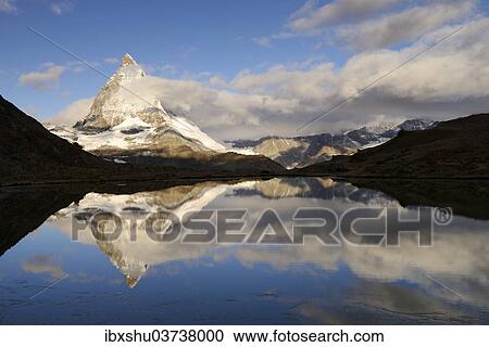 "Mt Matterhorn reflected in Riffelsee Lake, Zermatt, Canton of Valais, Switzerland, Europe" View Large Photo Image Stock Image - "Mt Matterhorn reflected in Riffelsee Lake, Zermatt, Canton of Valais, Switzerland, Europe". Fotosearch