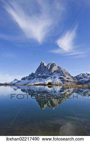 "Mt Peitlerkofel or Sas de Puetia, 2875m, is reflected in a lake near Enzian Hut, Plose, South Tyrol, Italy, Europe" View Large Photo Image Stock Image - "Mt Peitlerkofel or Sas de Puetia, 2875m, is reflected in a lake near Enzian Hut, Plose, South Tyrol, Italy, Europe". Fotosearch