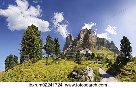 Picture - "Mt Peitlerkofel, Sasso delle Putia, with mountain forest and trail at Wuerzjoch, Passo delle Erbe, Villnoess, Funes, Dolomites, South Tyrol, Italy, Europe". Fotosearch