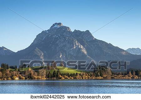 "Mt Saeuling, 2047m, Ammergau Alps, at front Hopfensee Lake near Fuessen, Ostallgaeu region, Allgaeu, Bavaria, Germany, Europe" View Large Photo Image Stock Photography - "Mt Saeuling, 2047m, Ammergau Alps, at front Hopfensee Lake near Fuessen, Ostallgaeu region, Allgaeu, Bavaria, Germany, Europe". Fotosearch