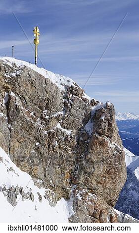 Stock Image - "Mt. Zugspitze, 2962m, with its summer cross restored in 2009, Wettersteingebirge mountains, Werdenfels, Upper Bavaria, Bavaria, Germany, Europe". Fotosearch