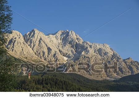 Stock Photography - "Mt Zugspitze in the evening light, Grainau, Bavaria, Germany, Europe". Fotosearch