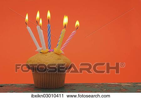 Muffin with birthday candles View Large Photo Image Stock Image - Muffin with birthday candles. Fotosearch