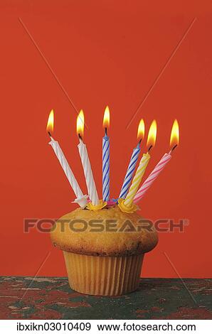 Muffin with birthday candles View Large Photo Image Stock Photo - Muffin with birthday candles. Fotosearch