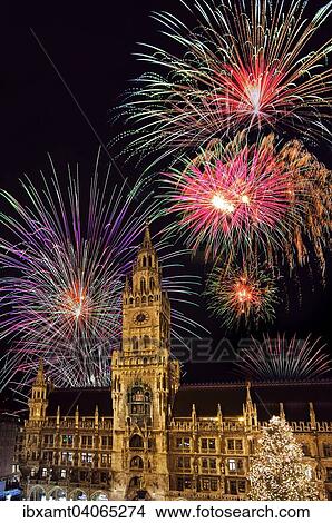 Picture - "Munich City Hall, Marienplatz square, with New Year's fireworks, Munich, Upper Bavaria, Bavaria, Germany, Europe". Fotosearch