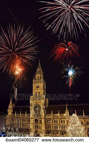 Stock Photo - "Munich City Hall, Marienplatz square, with New Year's fireworks, Munich, Upper Bavaria, Bavaria, Germany, Europe". Fotosearch