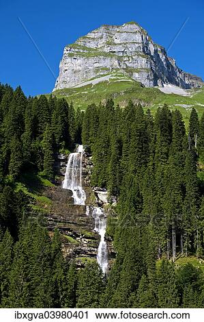 Stock Image - "Muota waterfall underneath Mt Apler Stock, Sali, Bisistal Valley, Canton of Schwyz, Switzerland, Europe". Fotosearch