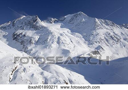 "Mutmal mountain ridge and Mt Mutmalspitze, Tyrol, Austria, Europe" View Large Photo Image Stock Image - "Mutmal mountain ridge and Mt Mutmalspitze, Tyrol, Austria, Europe". Fotosearch