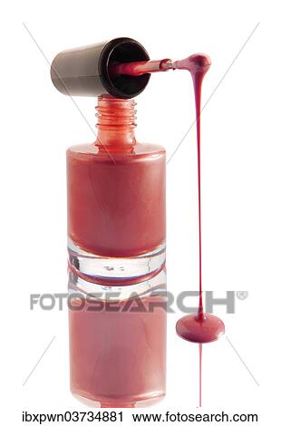 Nail varnish dripping from a nail varnish brush balanced on a nail varnish bottle View Large Photo Image Stock Image - Nail varnish dripping from a nail varnish brush balanced on a nail varnish bottle. Fotosearch